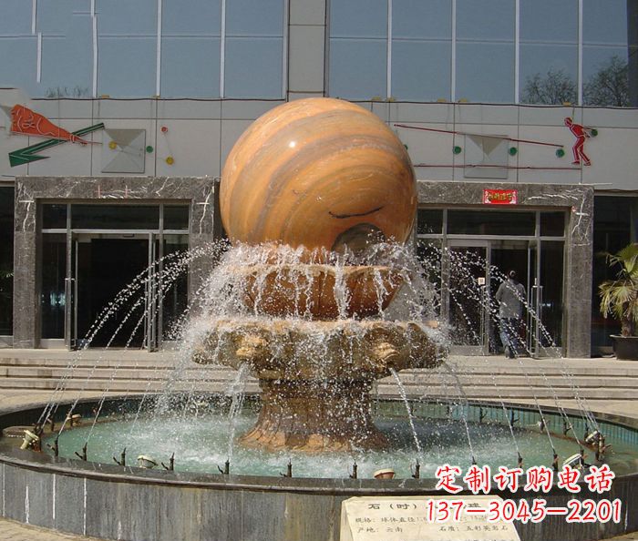 四川石来运转球晚霞红风水球石雕
